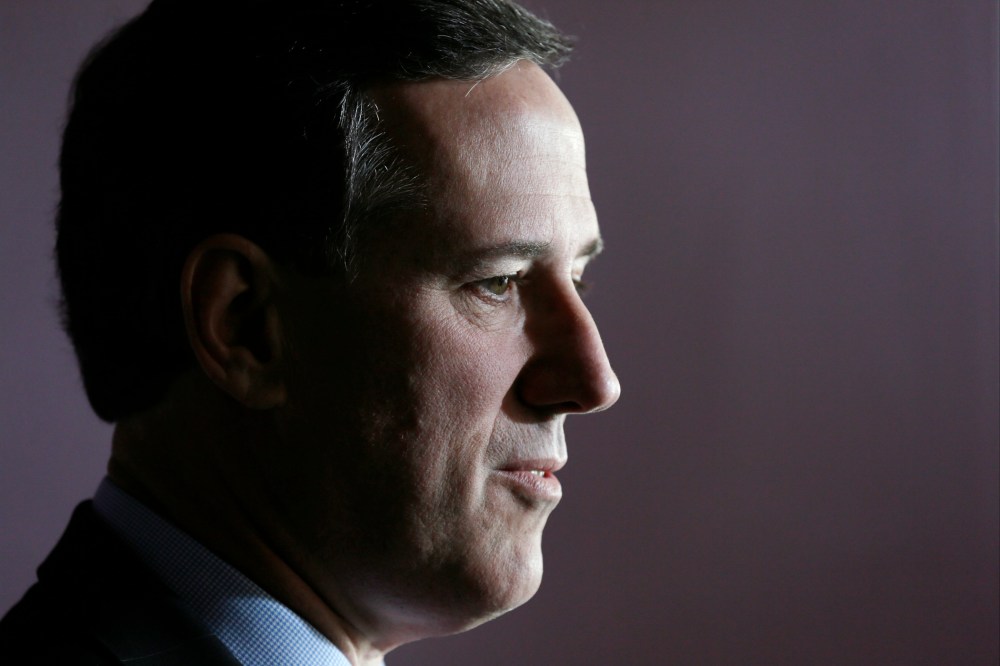 Former Penn. Senator Rick Santorum speaks during a news conference, March 26, 2014, in Johnson, Iowa.