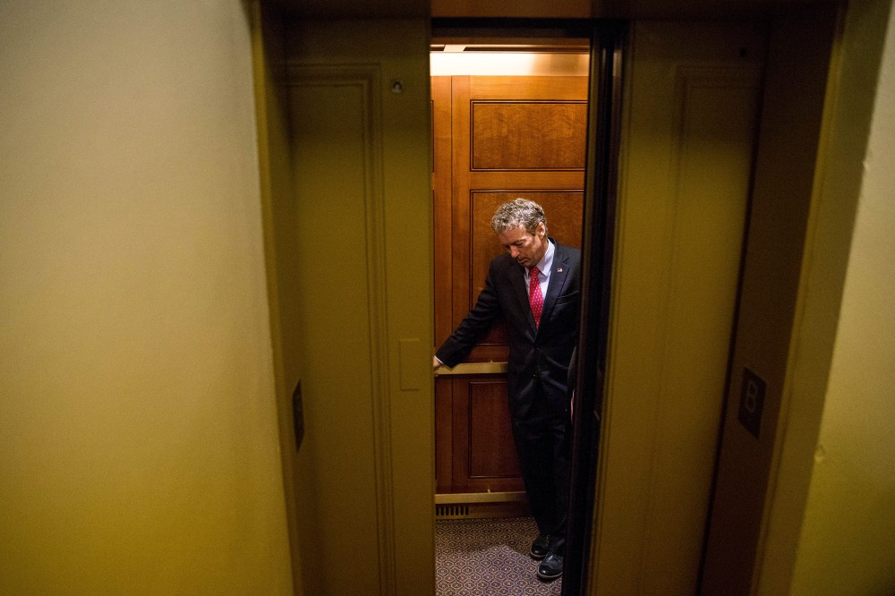Republican presidential candidate, Sen. Rand Paul, R-Ky. departs in an elevator after speaking at a news conference on Capitol Hill in Washington, D.C., June 2, 2015. (Photo by Andrew Harnik/AP)
