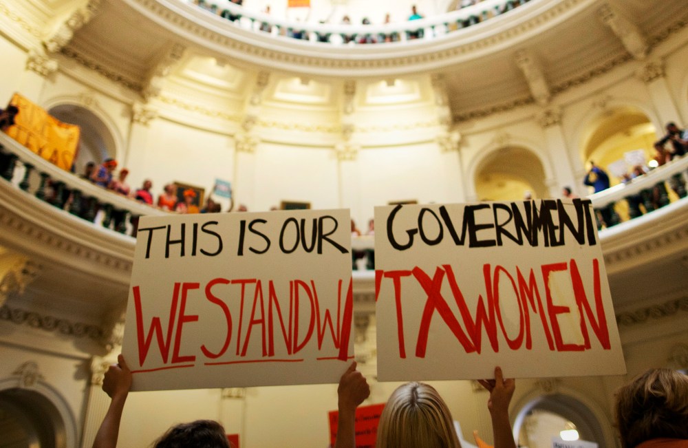 Abortion rights supporters rally on the floor of the State Capitol rotunda in Austin, Texas, July 12, 2013.