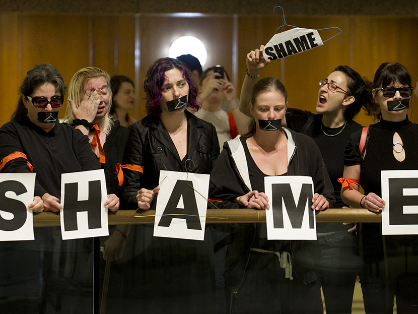 Lenell Ripley, second from left, cries as she demonstrates with other abortion rights supporters outside the Capitol auditorium in Austin, Texas, Thursday July 18, 2013. (Photo by Jay Janner/Austin American-Statesman/AP)