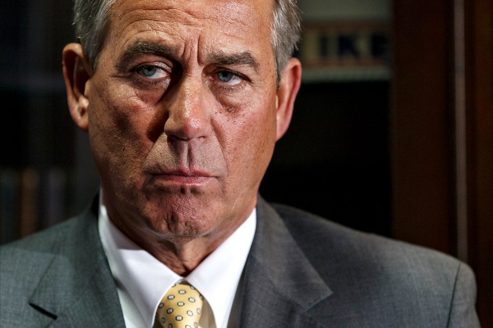 John Boehner meets with reporters at the RNC headquarters in Washington, Jan. 28, 2014.
