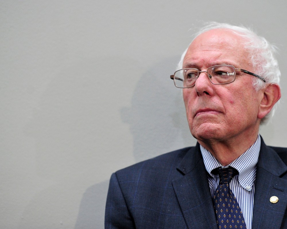 U.S. Sen. and presidential candidate Bernie Sanders listens to one of the speakers after making remarks at the Conference on the Greek debt crisis in Washington, DC, July 30, 2015. (Photo by Ron Sachs/picture-alliance/dpa/AP)