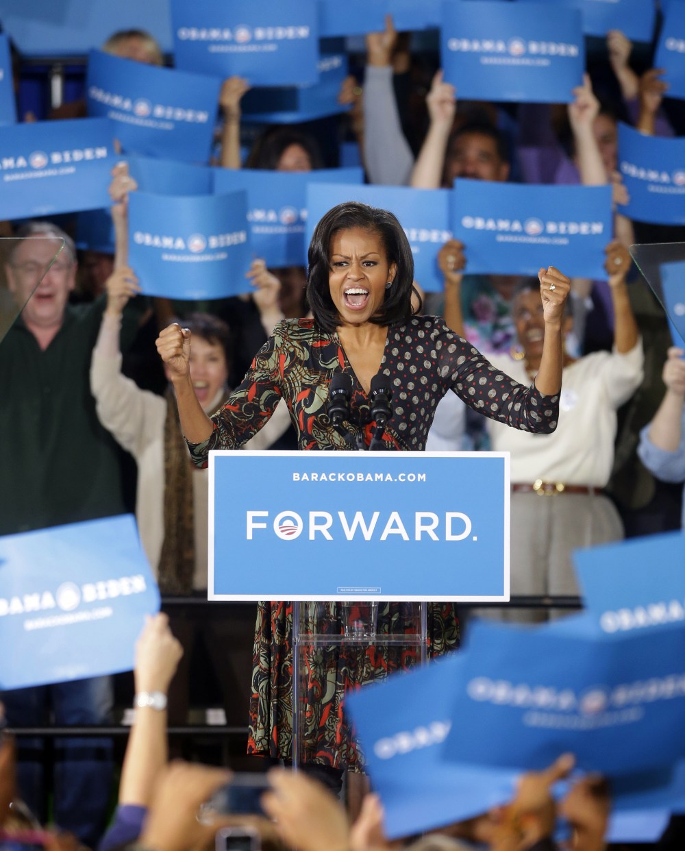 First lady Michelle Obama speaks to supporters during a campaign event at the Loudoun County Fairgrounds, Tuesday, Oct. 9, 2012, in Leesburg, Va. (AP Photo/Pablo Martinez Monsivais)