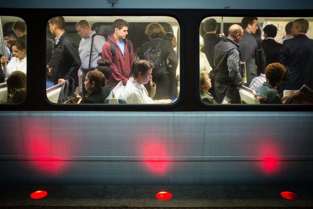 Passengers fill up Washington Metro subway cars in Arlington, Va., Oct. 17, 2013.