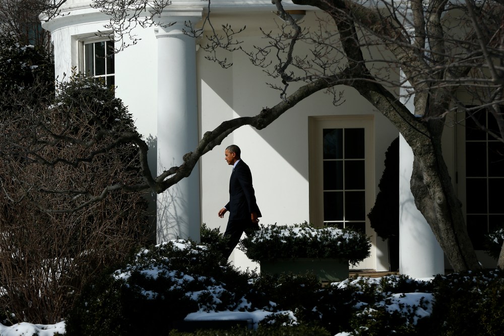 President Barack Obama walks from the Oval Office in Washington, March 5, 2014.