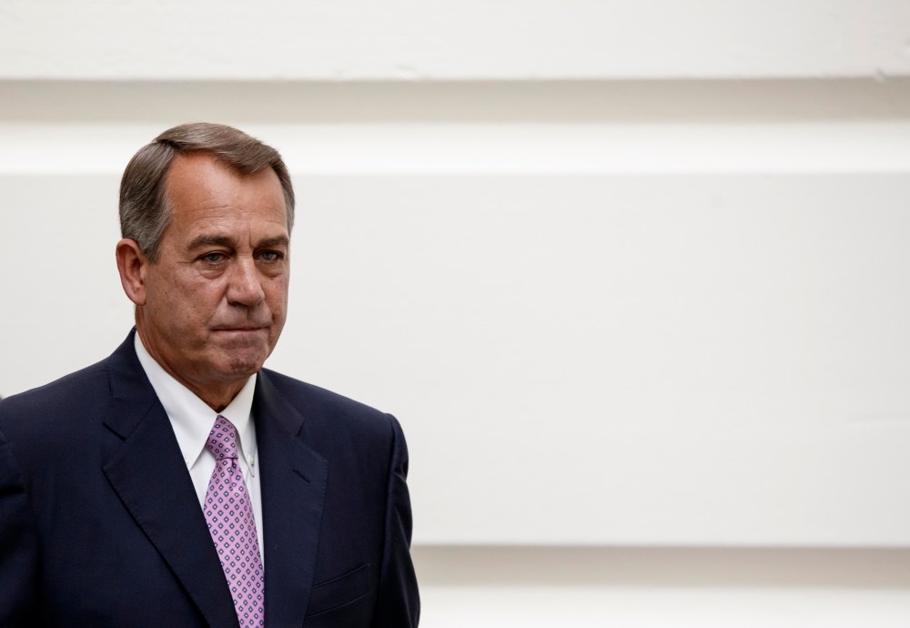 House Speaker John Boehner of Ohio walks to a Republican strategy session on Capitol Hill in Washington, Friday, Oct. 4, 2013.