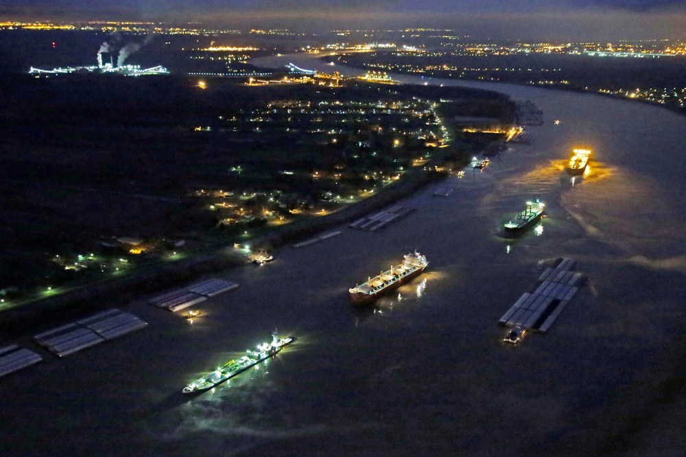 River traffic is halted along the Mississippi River between New Orleans and Vacherie, La., due to a barge leaking oil in St. James Parish, La., Feb. 23, 2014.