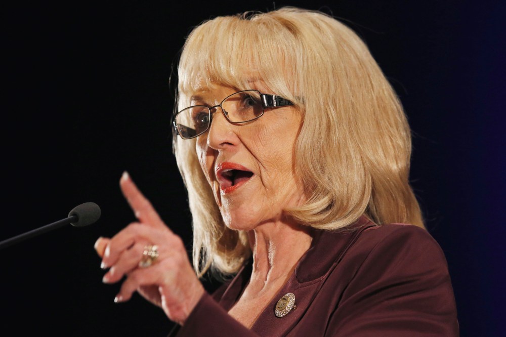 Arizona Gov. Jan Brewer speaks at the annual Arizona Chamber of Commerce and Industry legislative luncheon, Jan. 10, 2014.