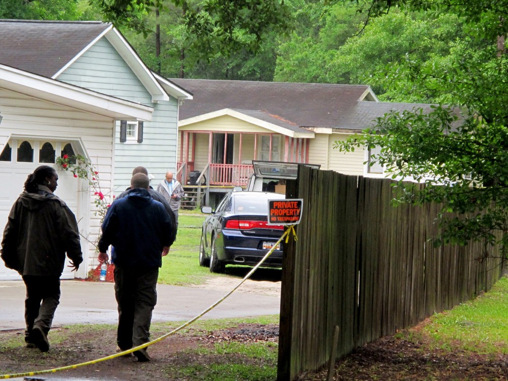 Investigators work at a scene of a shooting in Hollywood, SC., May 7, 2015. (Photo by Bruce Smith/AP)