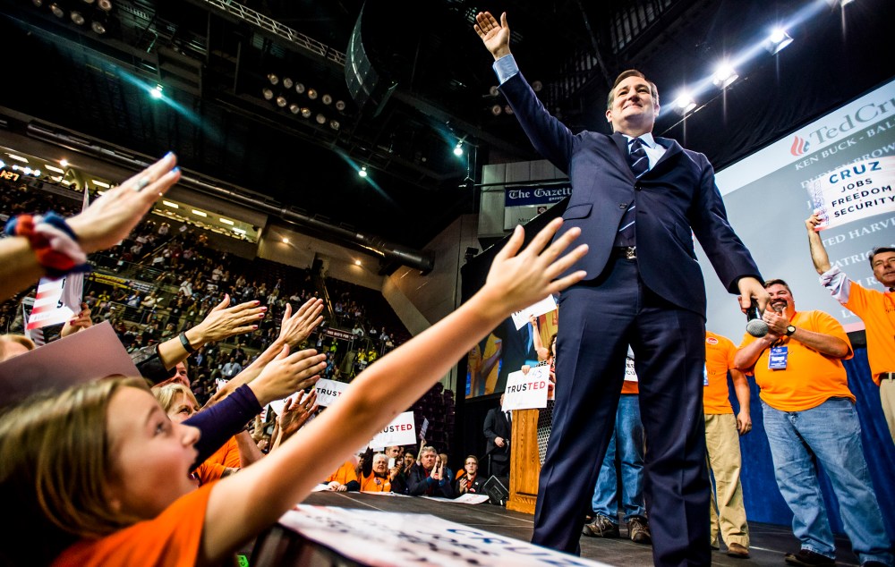 U.S. Sen. Ted Cruz waves to supporters after speaking at the Colorado State Republican Assembly at the Broadmoor World Arena on April 9, 2016, in Colorado Springs, Colo. (Photo by Stacie Scott/The Gazette/AP)