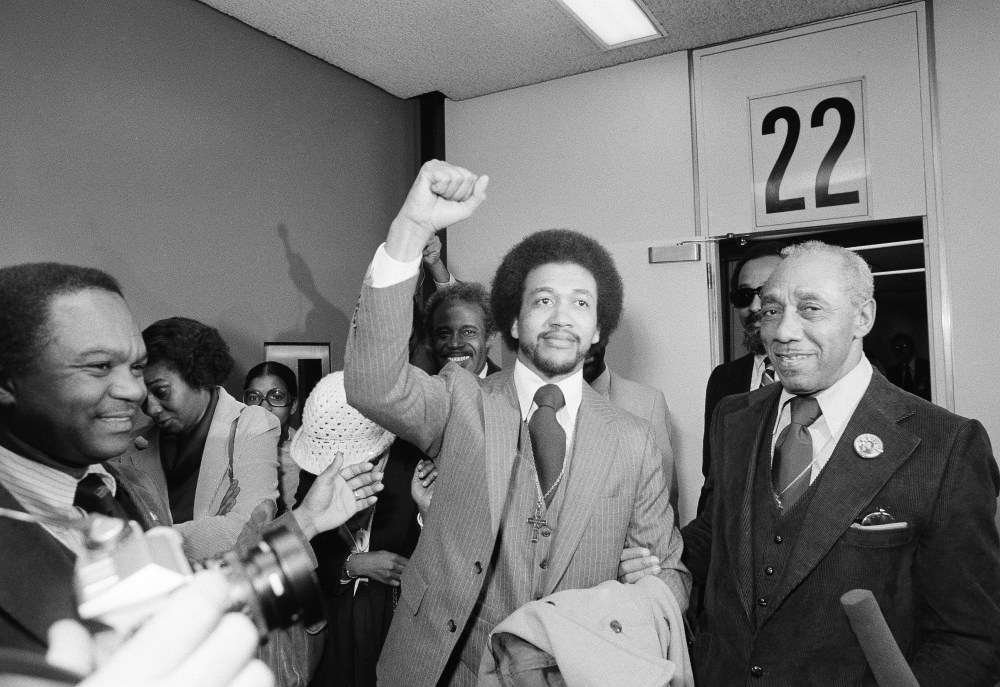 The Rev. Benjamin Chavis gives a clenched fist salute on December 14, 1979, after being paroled by then-North Carolina governor Jim Hunt. Chavis, one of the Wilmington 10 defendants, was pardoned on Monday by North Carolina's current governor, Bev...