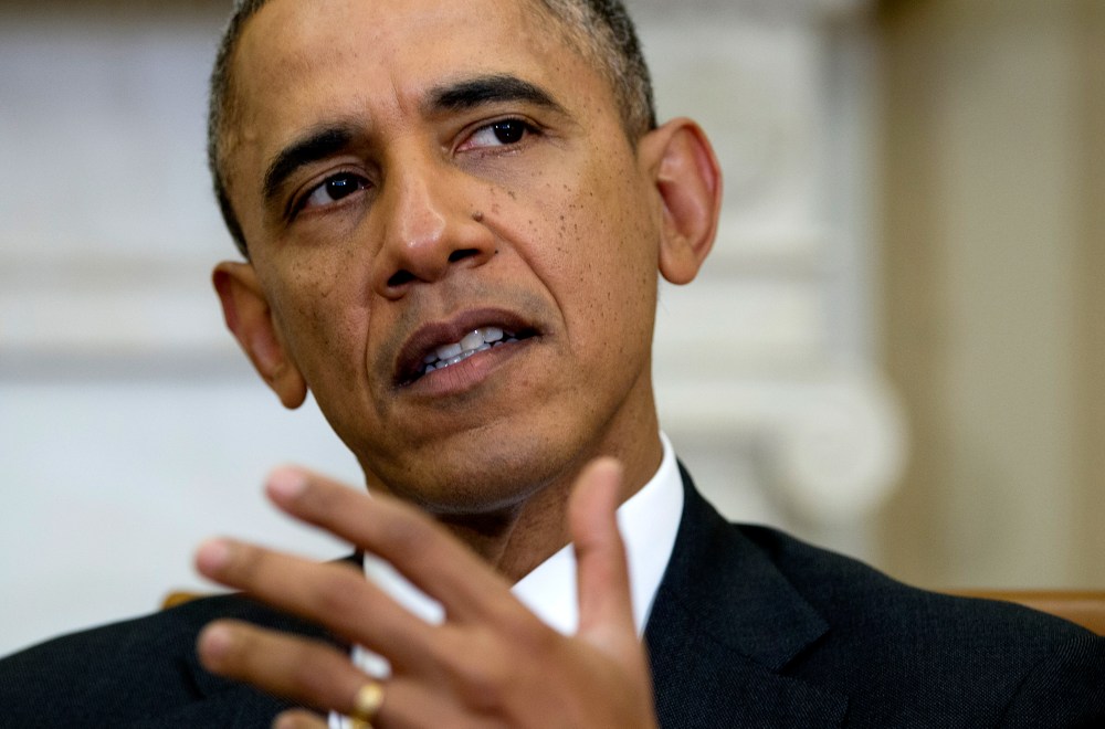 President Barack Obama gestures as he speaks to the media during an event, Feb. 6, 2014, in Washington.