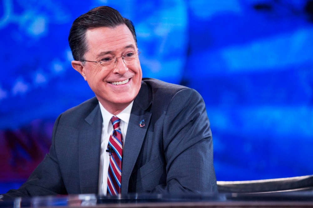 Television personality Stephen Colbert smiles while taping the "The Colbert Report" on Dec. 8, 2014. (Andrew Harrer/picture-alliance/DPA/Pool via CNP/AP)