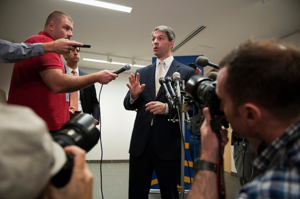 Virginia Republican gubernatorial candidate Ken Cuccinelli speaks with reporters following his address to the Virginia Energy and Opportunity Forum in Arlington, Va., Thursday, Aug. 29, 2013.