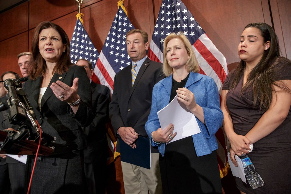 From left, Sen. Kelly Ayotte, R-N.H., Sen. Dean Heller, R-Nev., Sen. Kirsten Gillibrand, D-N.Y., and Anna, a survivor of sexual assault, appear at a news conference on Capitol Hill in Washington, D.C., July 30, 2014, to discuss "Campus Accountability and