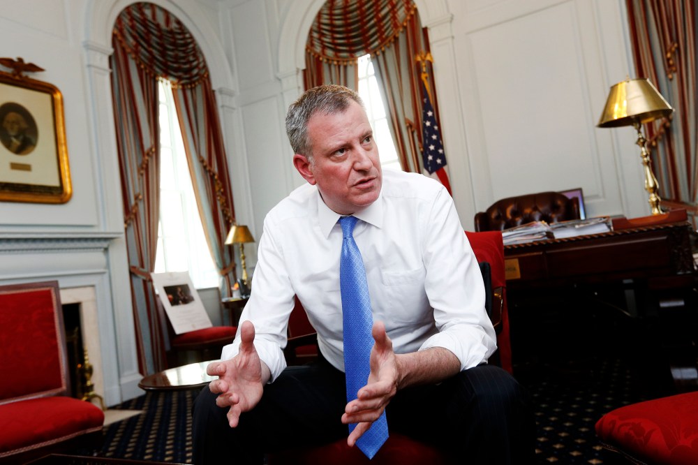 New York Mayor Bill de Blasio gives an interview at City Hall in New York, April 9, 2014.