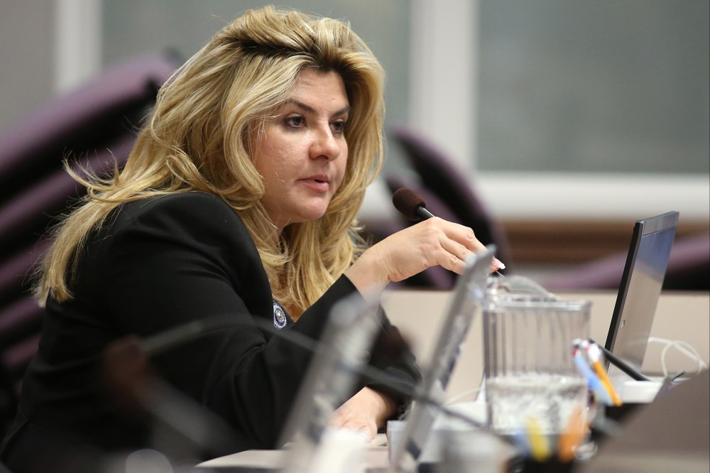 In this June 3, 2013, file photo, Nevada Assemblywoman Michele Fiore, R-Las Vegas, works in committee during the final day of the 77th Legislative session at the Legislative Building in Carson City, Nev. (Photo by Cathleen Allison/AP)