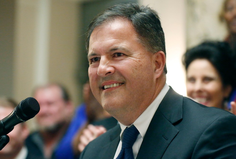 Former state Sen. Tim Johnson of Madison, smiles after announcing among representatives of various Mississippi Democratic associations that he is switching from Republican to Democrat to run for lieutenant governor of Mississippi.