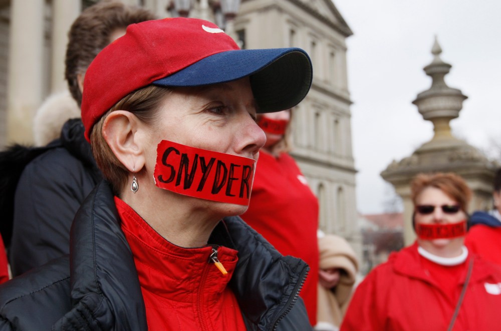 Linda Erspamer, a nurse, protests Michigan's new "right-to-work" legislation on December 10. (AP Photo/Carlos Osorio)