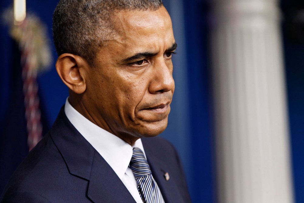 President Barack Obama pauses while speaking about the situation in Ukraine, July 18, 2014, in the Brady Press Briefing Room of the White House in Washington, D.C.