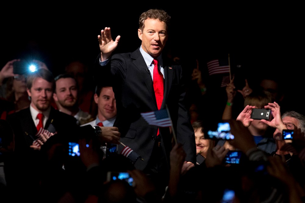 Sen. Rand Paul, R-Ky. arrive to a cheering and photo taking crowd for his announcement of the start of his presidential campaign, April 7, 2015, at the Galt House Hotel in Louisville, Ky. (Photo by Carolyn Kaster/AP)