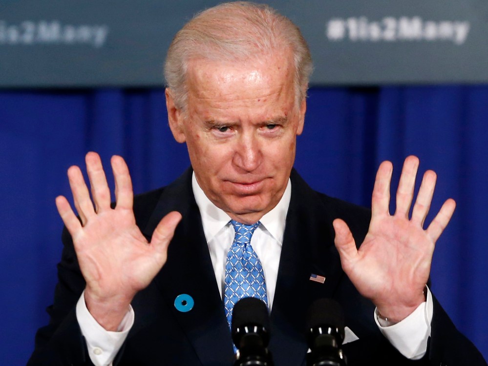 Vice President Joe Biden gestures  as he speaks about reducing domestic violence, Wednesday, March 13, 2013, at the Montgomery County Executive Office Building in Rockville, Md. (Photo by Charles Dharapak/AP Photo)