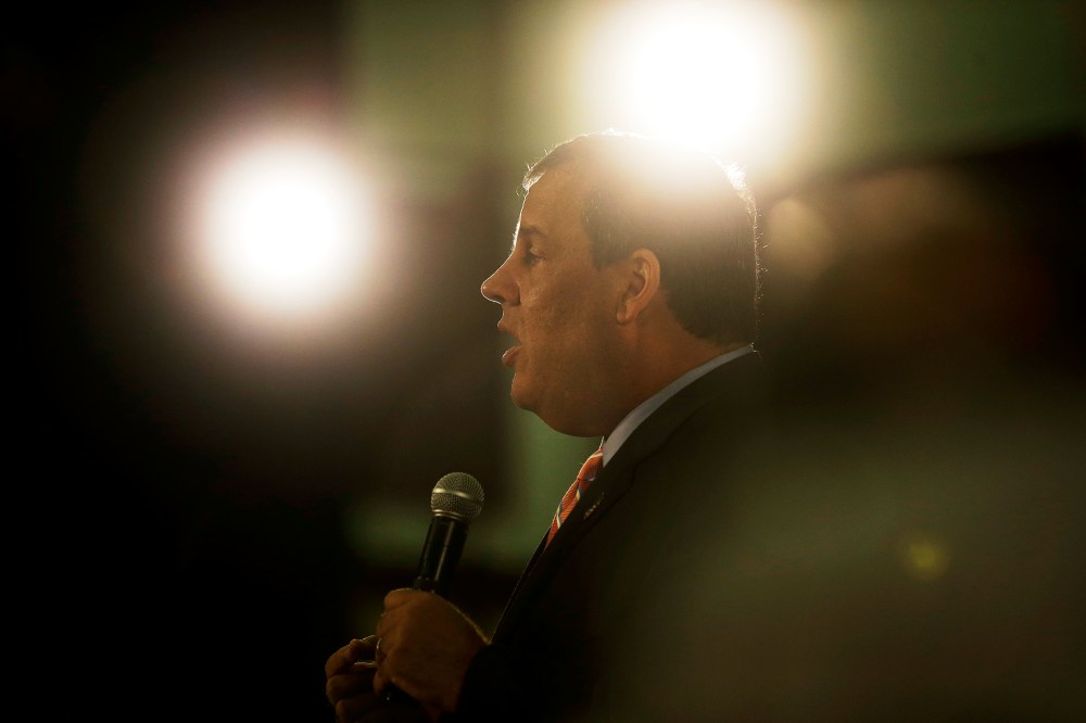 New Jersey Gov. Chris Christie, center right, addresses a gathering at a town hall meeting Wednesday, June 25, 2014, in Haddon Heights, N.J.