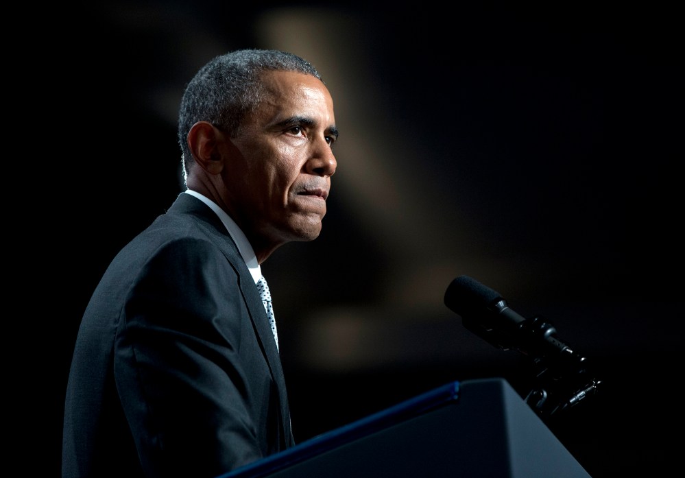 President Barack Obama pauses as he speaks about gun violence at the Annual Meeting of the U.S. Conference of Mayors in San Francisco, June 19, 2015. (Photo by Carolyn Kaster/AP)
