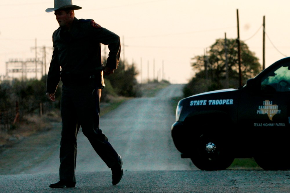 A Texas State Trooper at a roadblock, April 6, 2008, in Eldorado, Texas. (Photo by Tony Gutierrez/AP)