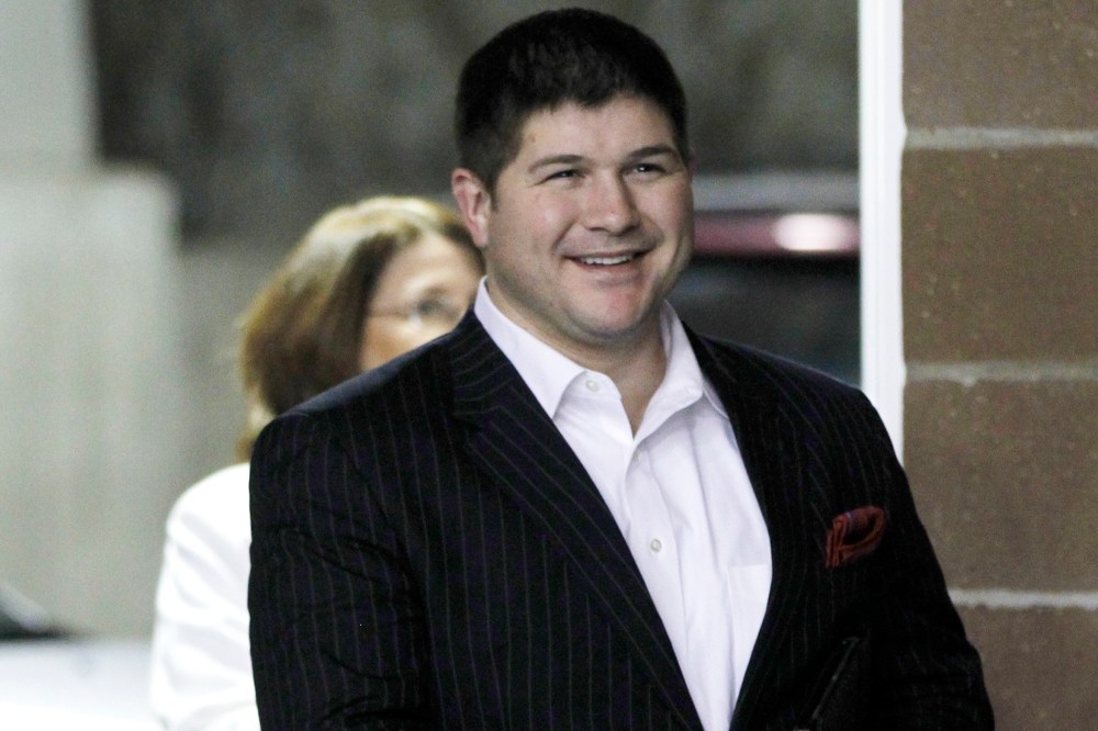 Jesse Benton, campaign manager for Republican presidential candidate, Rep. Ron Paul, R-Texas, arrives at a campaign event honoring veterans at the Iowa State Fairgrounds in Des Moines, Iowa, Dec. 28, 2011. (Photo by Charles Dharapak/AP)