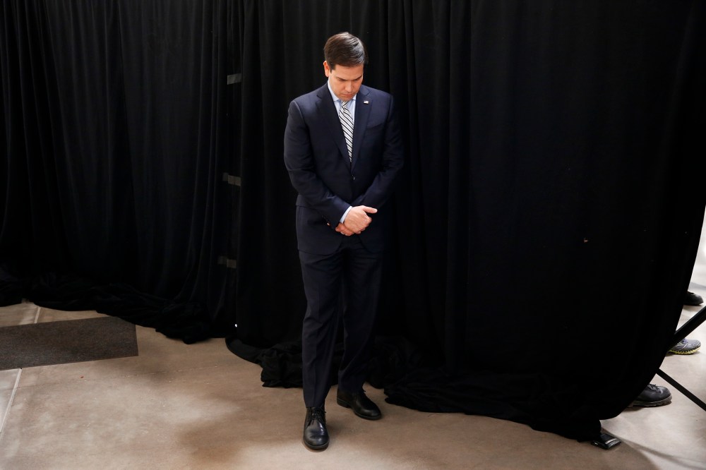 Republican presidential candidate, Sen. Marco Rubio, R-Fla., bows his head in prayer at a campaign rally in Idaho Falls, Idaho, March 6, 2016. (Photo by Paul Sancya/AP)