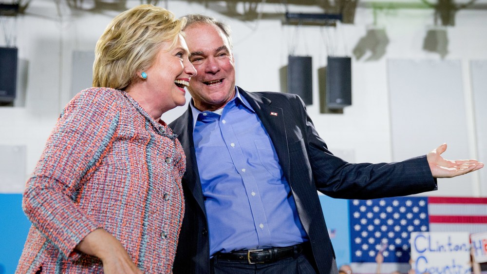 Democratic presidential candidate Hillary Clinton and Sen. Tim Kaine, D-Va.,participate in a rally at Northern Virginia Community College in Annandale, Va., July 14, 2016. (Photo by Andrew Harnik/AP)