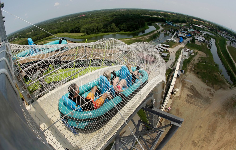 In this July 9, 2014, file photo, riders go down the water slide called "Verruckt" at Schlitterbahn Waterpark in Kansas City, Kan.