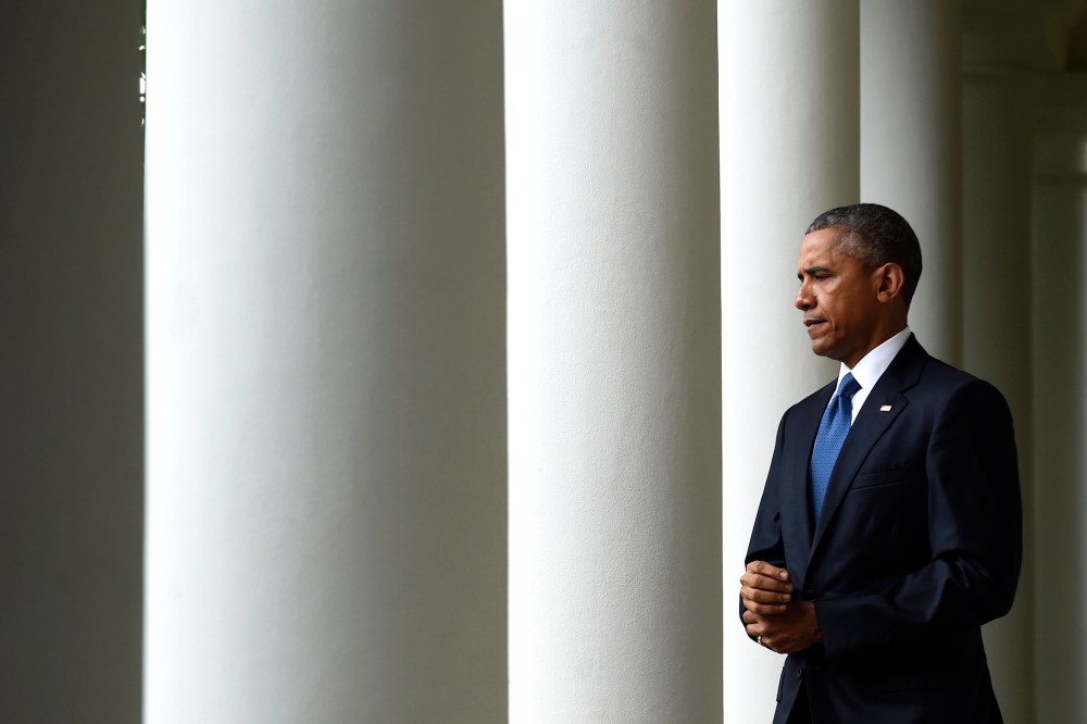 President Barack Obama walks to the Rose Garden of the White House in Washington, D.C., June 26, 2015. (Photo by Susan Walsh/AP)