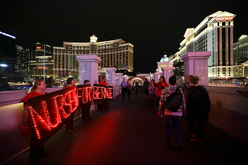 Members of the National Nurses United union hold LED signs to show their support for Democratic presidential candidate Sen. Bernie Sanders, I-Vt., Feb. 17, 2016, in Las Vegas. (Photo by Jae C. Hong/AP)