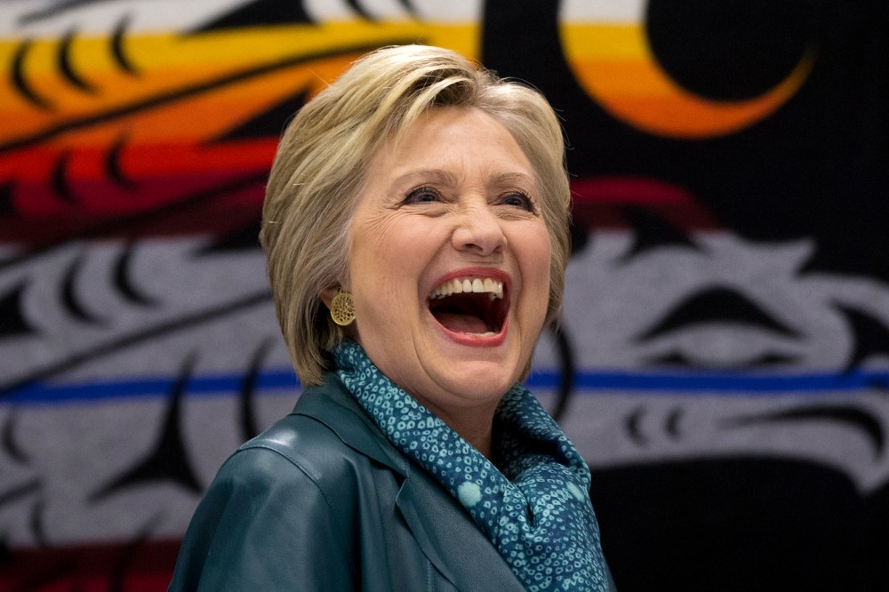 Democratic presidential candidate Hillary Clinton laughs as she participates in a roundtable with Washington Tribal Leaders at Chief Leschi School in Puyallup, Wash., March 22, 2016. (Photo by Carolyn Kaster/AP)