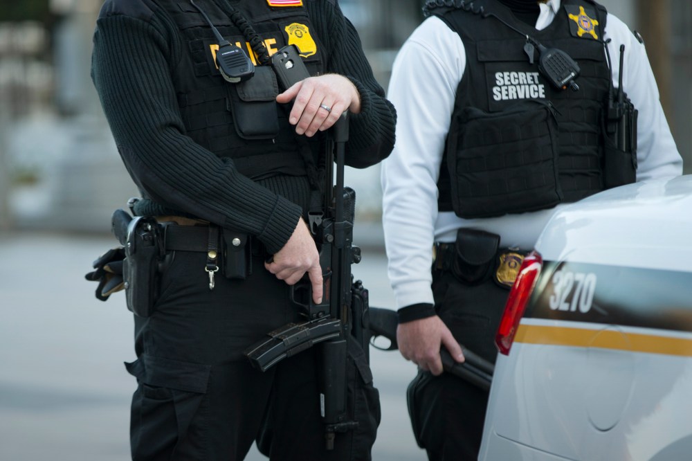 Secret Service police stand guard in Washington, D.C. (Photo by Evan Vucci/AP)