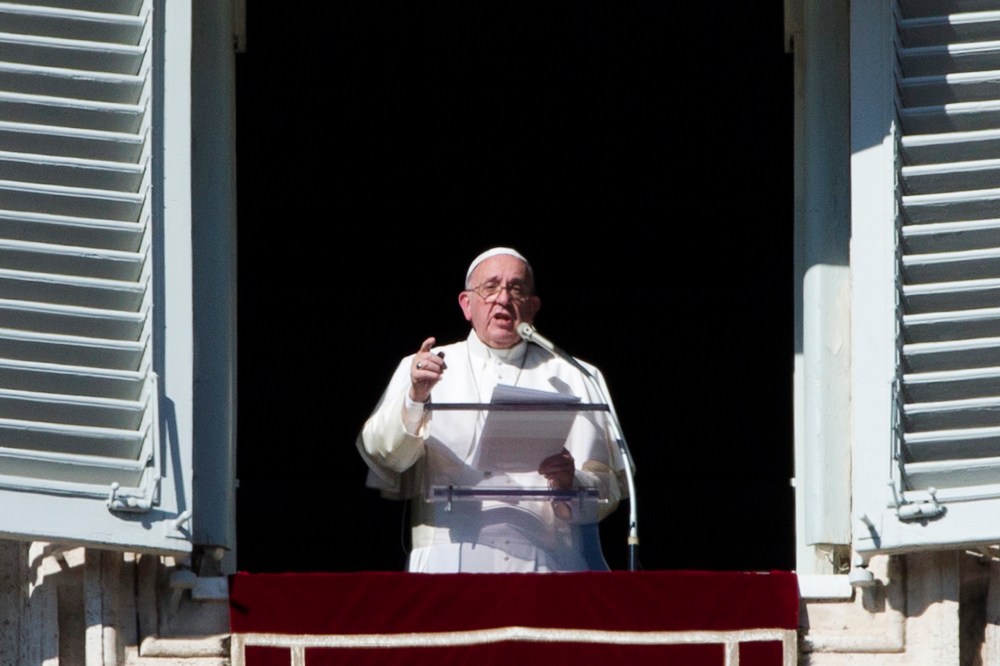 Pope Francis delivers his message during his Angelus prayer from his studio window overlooking St. Peter's Square, at the Vatican, Sunday, Nov. 8, 2015. (Photo by Alessandra Tarantino/AP)
