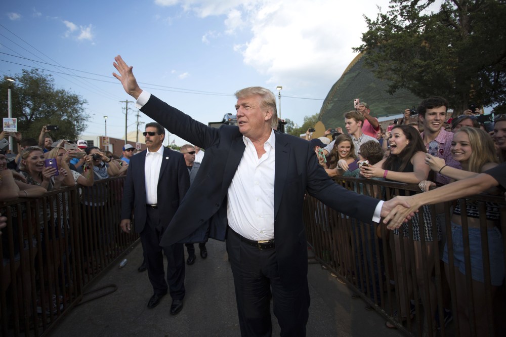Republican presidential candidate Donald Trump greeets supporters before he delivers his message during a campaign rally at the state fair in Oklahoma City, Sept. 25, 2015. (Photo by J Pat Carter/AP)