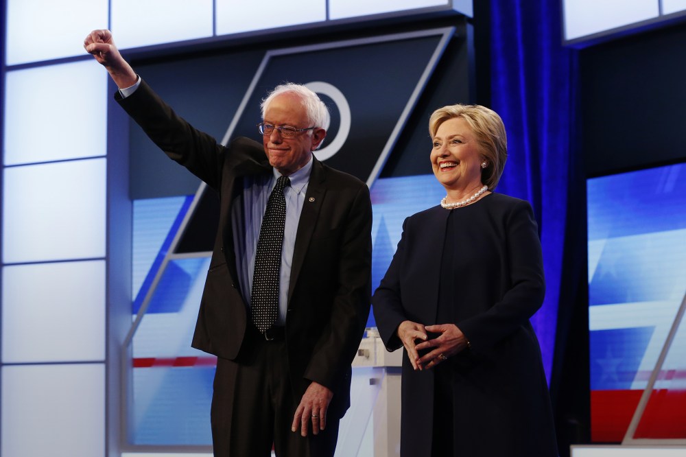 Democratic presidential candidates pose for the audience before the start of the Univision, Washington Post Democratic presidential debate at Miami-Dade College, March 9, 2016, in Miami, Fla. (Photo by Wilfredo Lee/AP)
