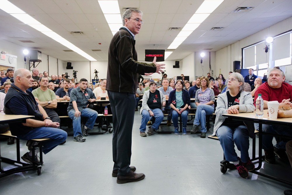 Republican presidential candidate, former Florida Gov. Jeb Bush, center, speaks during a campaign stop at Sturm, Ruger & Co. Inc., Jan. 21, 2016, in Newport, N.H. (Photo by John Minchillo/AP)