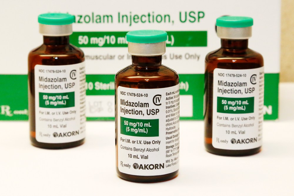 This July 25, 2014 photo shows bottles of the sedative midazolam at a hospital pharmacy in Oklahoma City. (AP)