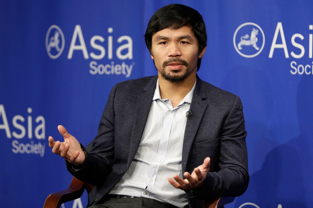 In this Oct. 12, 2015, file photo, Manny Pacquiao takes questions at the Asia Society in New York. (Photo by Seth Wenig/AP)