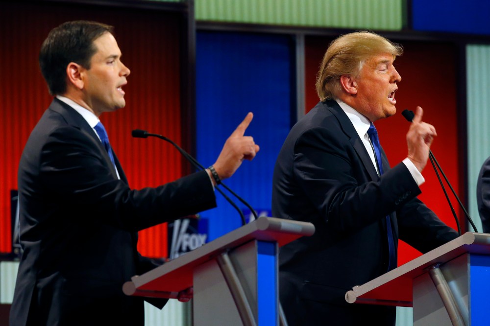 Republican presidential candidates Sen. Marco Rubio and businessman Donald Trump argue during a Republican presidential primary debate at Fox Theatre on March 3, 2016, in Detroit, Mich. (Paul Sancya/AP)