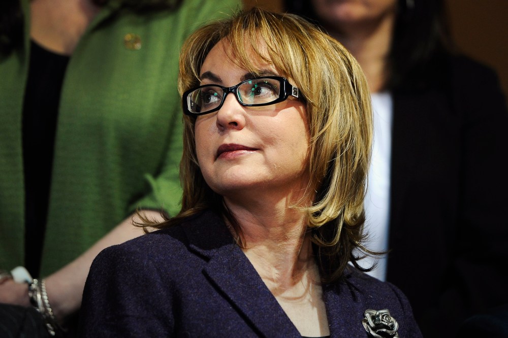 Former Arizona U.S. Rep. Gabby Giffords listens, during a news conference at the state Capitol, March 17, 2015, in Hartford, Conn. (Photo by Jessica Hill/AP)