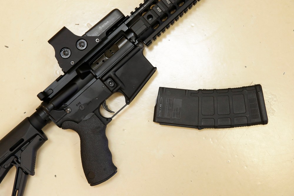 In this Oct. 3, 2013, file photo, a custom-made semi-automatic hunting rifle with a high-capacity detachable magazine is displayed at TDS Guns in Rocklin, Calif. (Photo by Rich Pedroncelli/AP)