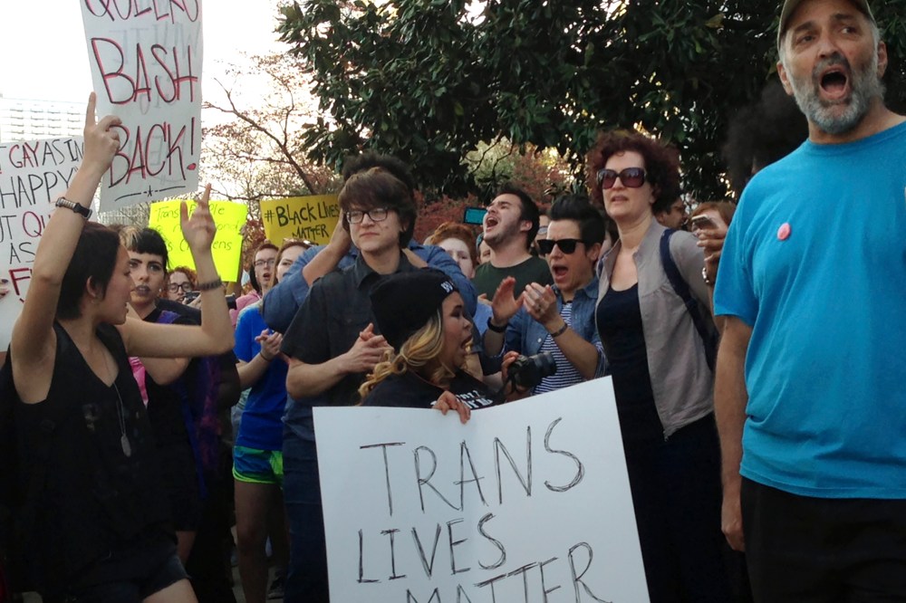 People protest outside the North Carolina Executive Mansion in Raleigh, N.C., March 24, 2016. (Photo by Emery P. Dalesio/AP)