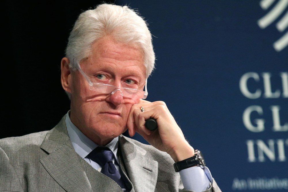 Former President Bill Clinton listens during a plenary session at the Clinton Global Initiative Winter Meeting on Feb. 10, 2015 in N.Y. (Photo by Greg Allen/Invision/AP)