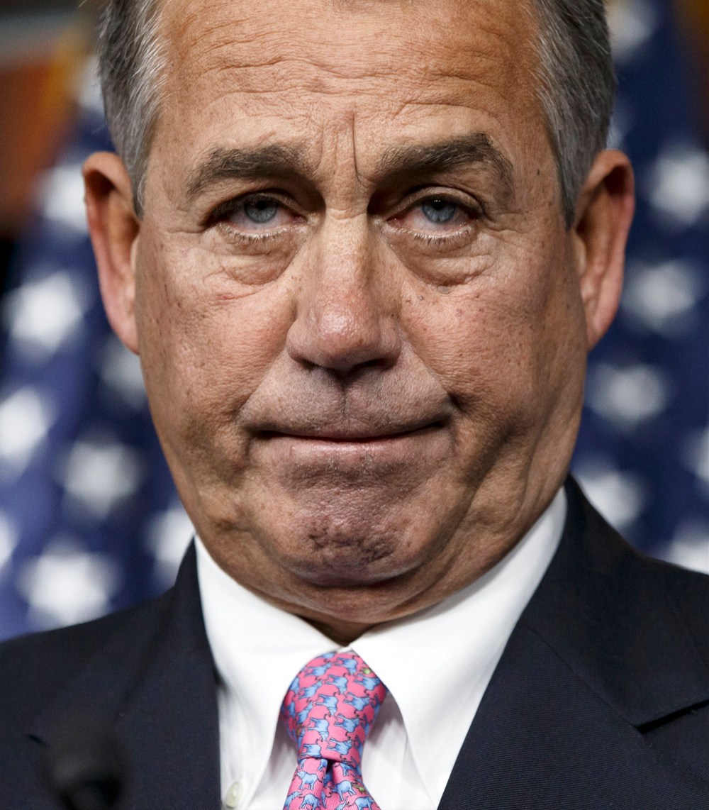 House Speaker John Boehner of Ohio pauses during a news conference on Capitol Hill in Washington, Thursday, February 6, 2014.