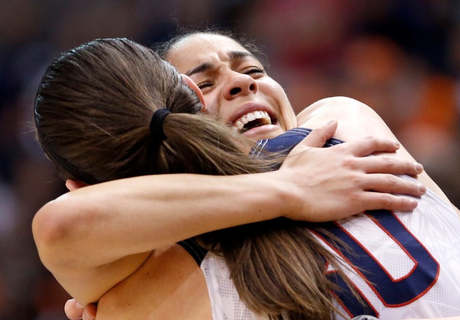Connecticut's Kia Nurse, rear, hugs teammate Breanna Stewart after defeating Syracuse in the championship game at the women's Final Four in the NCAA college basketball tournament, April 5, 2016, in Indianapolis. (Photo by AJ Mast/AP)